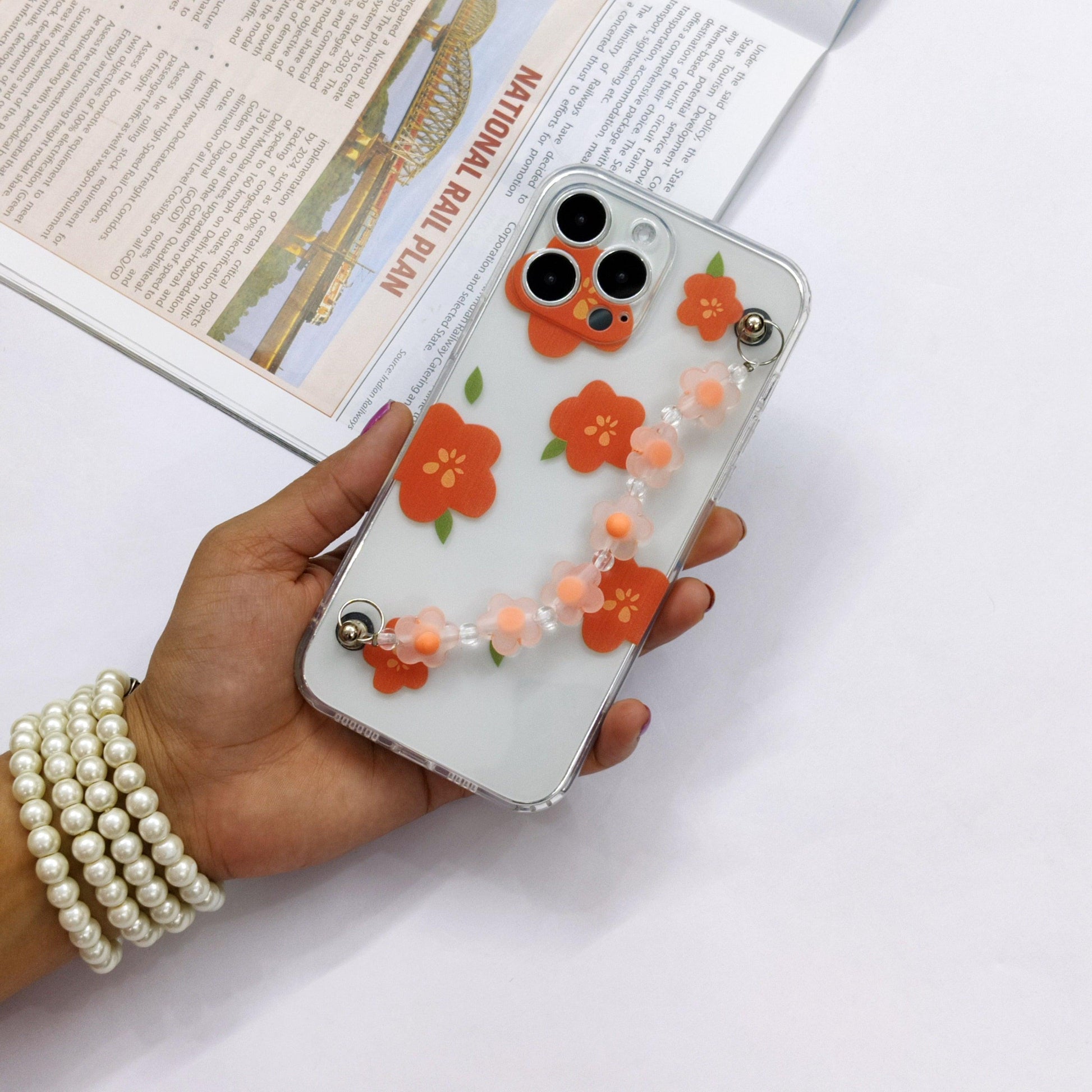 Cute Flowers Phone Case With Hand Chain iPhone (Orange Flower) - ShopOnCliQ