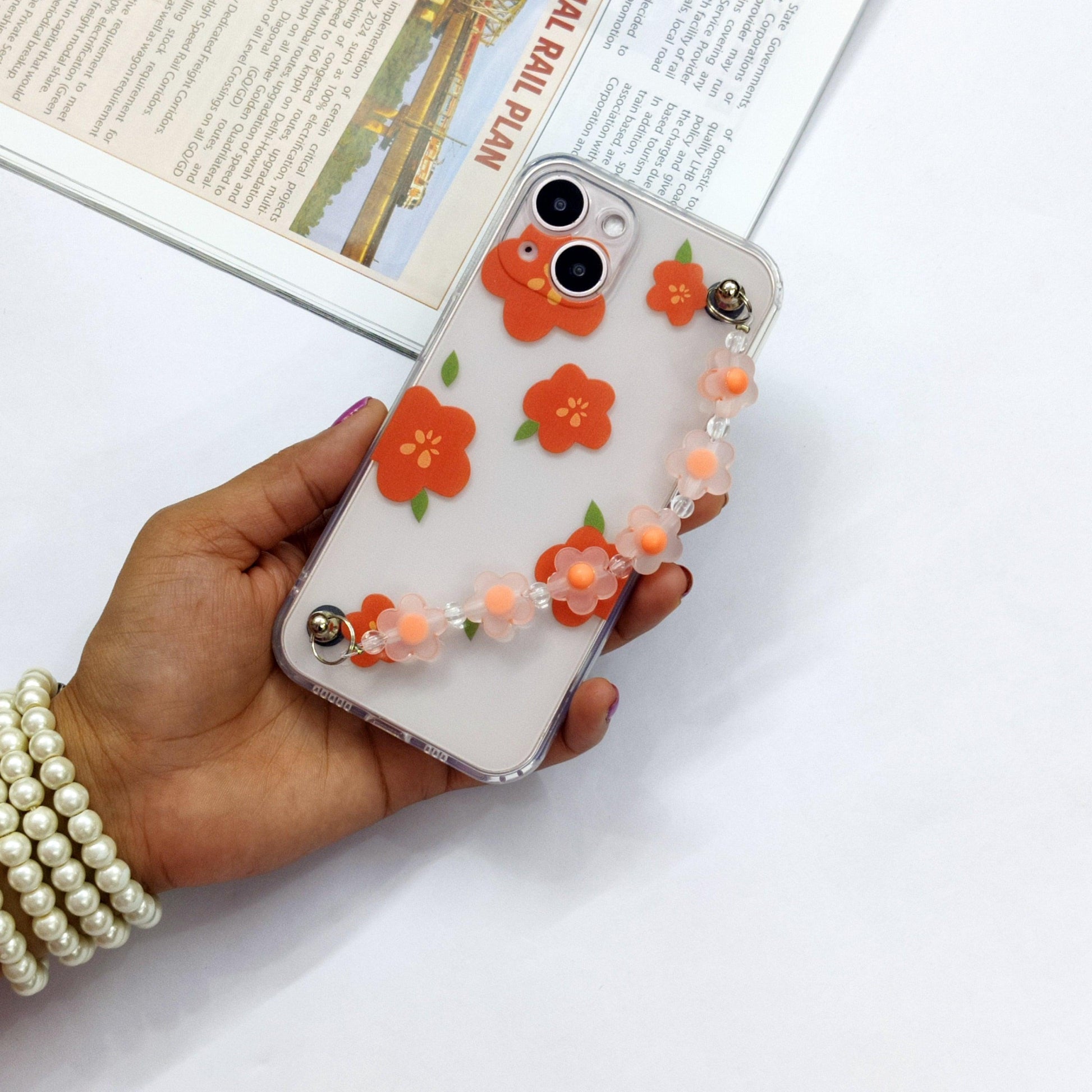 Cute Flowers Phone Case With Hand Chain iPhone (Orange Flower) - ShopOnCliQ